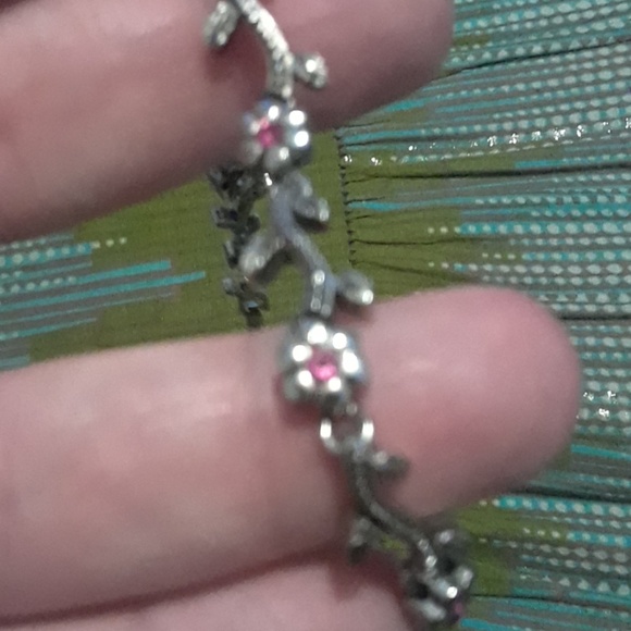Silver toned flower bracelet with pink stones - Picture 3 of 3
